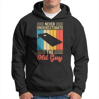 Never Underestimate The Old Guy Funny Cornhole Player Mens Hoodie - Seseable