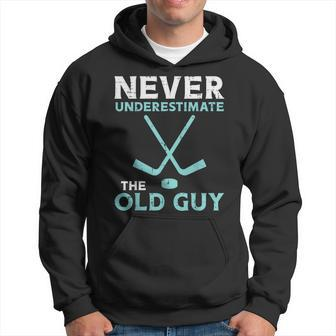 Never Underestimate The Old Guy Ice Hockey Funny Fathers Day Gift For Mens Hoodie - Seseable