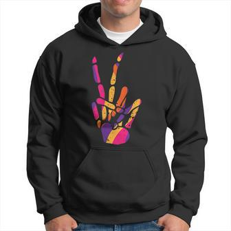 Pocket Skeleton Hand Peace Sign Scary Cool Halloween Hippie Halloween Hoodie | Mazezy