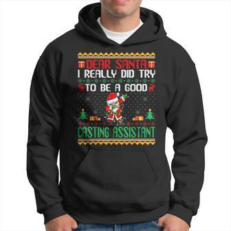 Santa Try To Be A Good Casting Assistant Christmas Hoodie | Mazezy