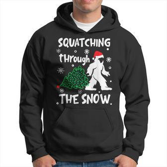 Squatching Through The Snow Christmas Sasquatch Santa Hat Hoodie - Thegiftio UK