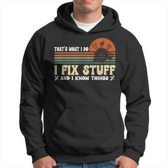 That's What I Do I Fix Stuff And I Know Things Vintage Hoodie | Mazezy
