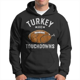 Turkey And Touchdowns Thanksgiving Football Hoodie | Mazezy