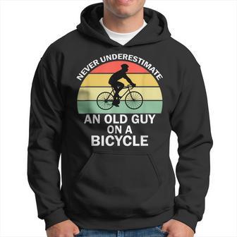 Never Underestimate An Old Guy On A Bicycle Biker Hoodie - Thegiftio UK