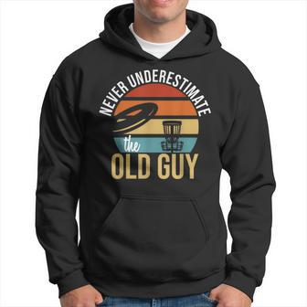 Never Underestimate The Old Guy Retro Disc Golf Hoodie - Seseable