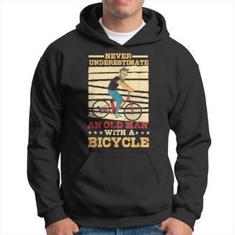 Never Underestimate An Old Man With A Bicycle Rider Hoodie - Thegiftio UK