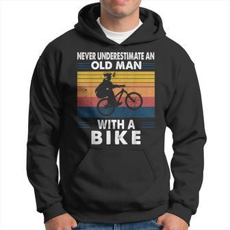 Never Underestimate An Old Man With A Bike Vintage Retro Hoodie - Seseable