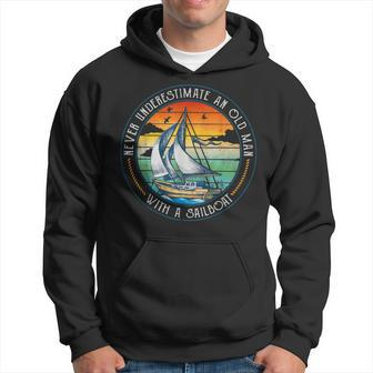 Never Underestimate An Old Man With A Sailboat Sailing Hoodie | Mazezy