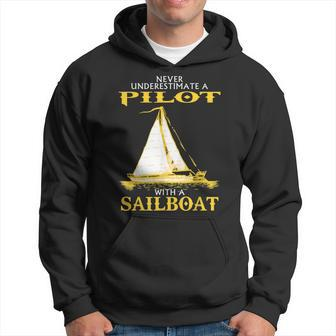 Never Underestimate Sailboat Pilot Hoodie - Seseable