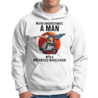 Never Underestimate A Man With A Motorized Wheelchair Hoodie - Seseable