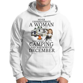 Never Underestimate A Woman Who Loves Camping Born December Hoodie - Seseable