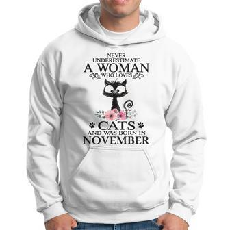 Never Underestimate A Woman Who Loves Cat Born In November Hoodie | Mazezy