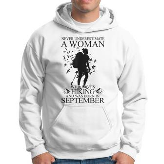 Never Underestimate A Woman Who Loves Hiking September Hoodie - Seseable