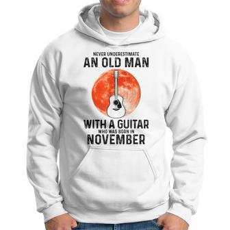 Never Underestimate An Old Man With A Guitar November Hoodie - Seseable