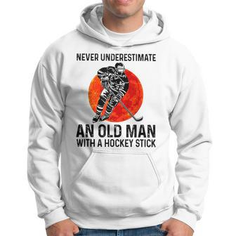 Never Underestimate An Old Man With A Hockey Stick Old Man Funny Gifts Hoodie | Mazezy