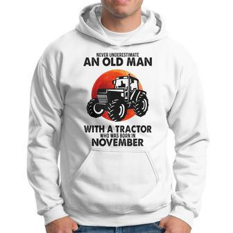 Never Underestimate An Old Man With A Tractor Born November Hoodie - Seseable