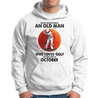 Never Underestimate An Old October Man Who Loves Golf Hoodie - Seseable