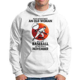 Never Underestimate An Old Woman Love Baseball November Old Woman Funny Gifts Hoodie | Mazezy