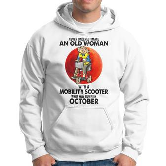 Never Underestimate An Old Woman Mobility Scooter October Old Woman Funny Gifts Hoodie | Mazezy