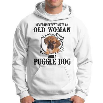 Never Underestimate An Old Woman With A Puggle Dog Old Woman Funny Gifts Hoodie | Mazezy