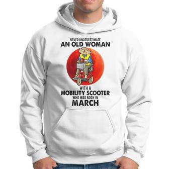 Never Underestimate An Old Woman With Mobility Scooter March Old Woman Funny Gifts Hoodie | Mazezy