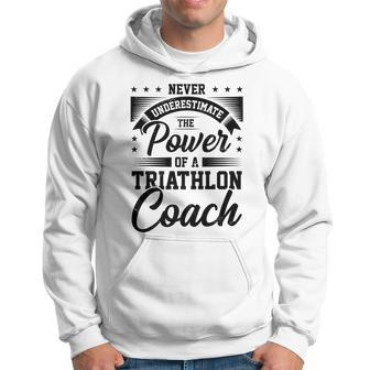 Never Underestimate The Power Of A Triathlon Coach Sport Hoodie - Seseable