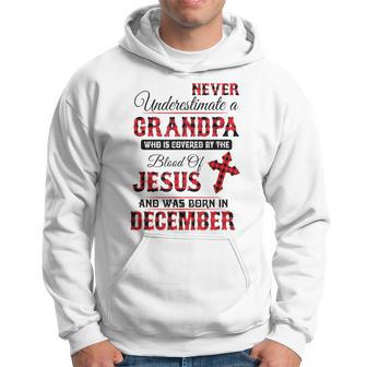 Never Underestimate A December Grandpa The Blood Of Jesus Hoodie - Monsterry CA