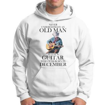 Never Underestimate A December Man With A Guitar Hoodie | Mazezy