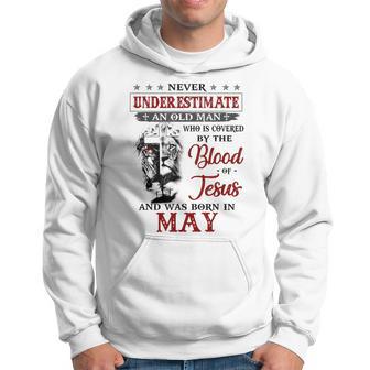 Never Underestimate A May Man Covered By Blood Of Jesus Hoodie | Seseable UK