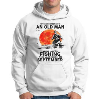 Never Underestimate Old Man Who Love Fishing September Hoodie - Thegiftio UK
