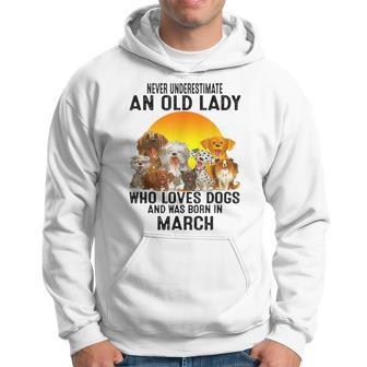 Never Underestimate An Old March Lady Who Loves Dogs Pet Hoodie - Seseable