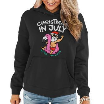 Christmas In July Santa Flamingo Funny Summer Vacation Beach Flamingo Funny Gifts Women Hoodie | Mazezy