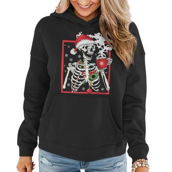 Christmas Skeleton With Smiling Skull Drinking Coffee Latte Women Hoodie | Mazezy
