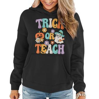 Groovy Halloween Trick Or Teach Retro Pumpkin Ghost Teacher Women Hoodie - Monsterry UK