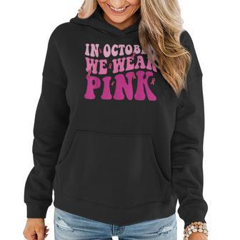 Groovy In October We Wear Pink Breast Cancer For Women Hoodie - Seseable