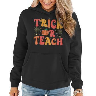 Groovy Trick Or Teach Halloween Teacher Life Girl Women Hoodie - Monsterry