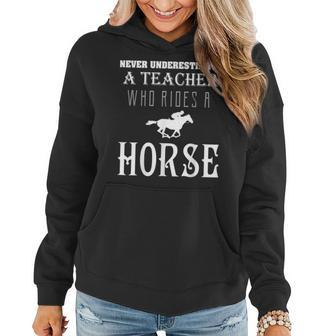 Horse Lovers Never Underestimate Teacher Rides Horse Ts Women Hoodie - Seseable
