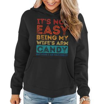 Its Not Easy Being My Wifes Arm Candy Funny Fathers Day Women Hoodie - Seseable