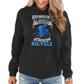 Never Underestimate A Man In His Seventies Ride A Bicycle Gift For Mens Women Hoodie | Mazezy