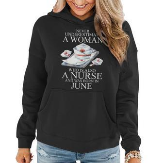 Never Underestimate A Woman Who Is A Nurse Born In June Women Hoodie - Seseable