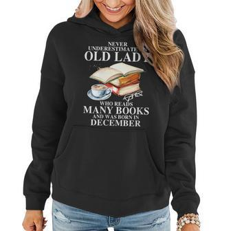 Never Underestimate An Old December Lady Who Read Many Books Gift For Womens Women Hoodie - Seseable