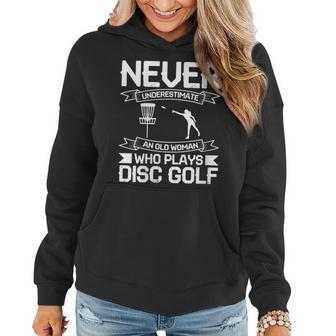 Never Underestimate An Old Woman Who Plays Disc Golf Gift For Womens Women Hoodie - Seseable