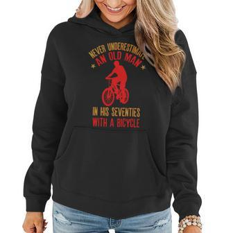 Never Underestimate Old Man In His Seventies With A Bicycle Old Man Funny Gifts Women Hoodie | Mazezy