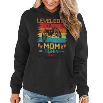 Retro Leveled Up To Mom Again 2023 Pregnancy Reveal Gaming Women Hoodie | Mazezy