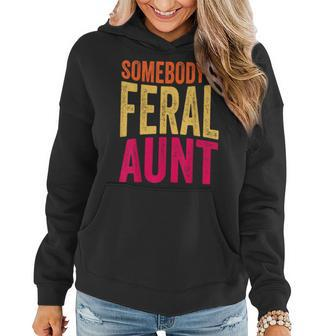 Somebodys Feral Aunt Groovy Aunty Women Aunts Funny Auntie Women Hoodie | Mazezy