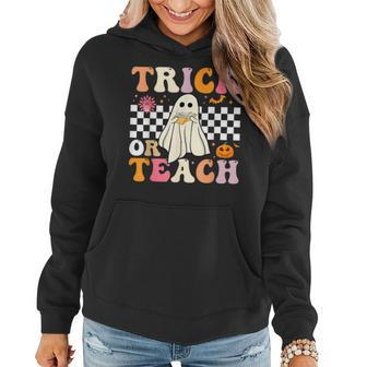 Trick Or Teach Groovy Halloween Retro Floral Ghost Teacher Women Hoodie - Seseable