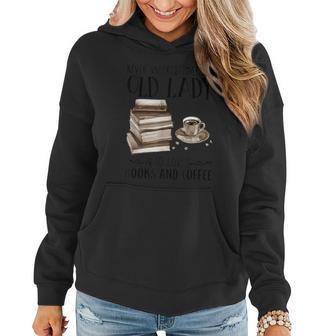 Never Underestimate An Old Lady Who Loves Books And Coffee Women Hoodie - Seseable