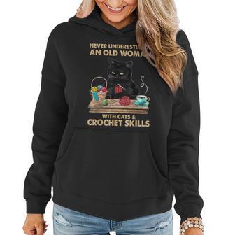 Never Underestimate Old Woman With Cats And Crochet Skills Women Hoodie - Thegiftio UK