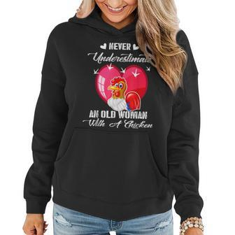 Never Underestimate An Old Woman With A Chicken Costume Women Hoodie - Monsterry