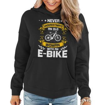 Never Underestimate An Old Woman With An E-Bike Women Hoodie - Monsterry